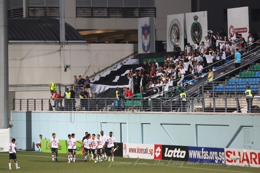 Terengganu players celebrate after Jean-Emmanuel Effa scores with a header from a free-kick in the 33rd minute.