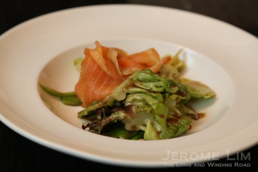 The smoked salmon salad with a walnut sauce dressing.