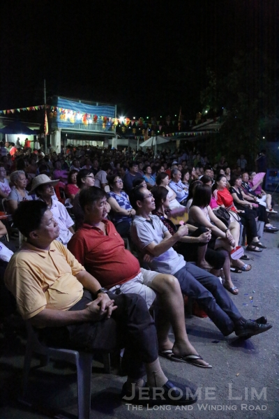 The large crowd seated in front of the stage.