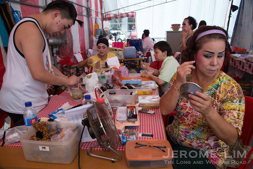 The back stage area is abuzz with preparation activity before each performance. 