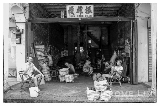 The charcoal shop -this one seen in Ipoh in 2010, was once a common sight in Singapore.
